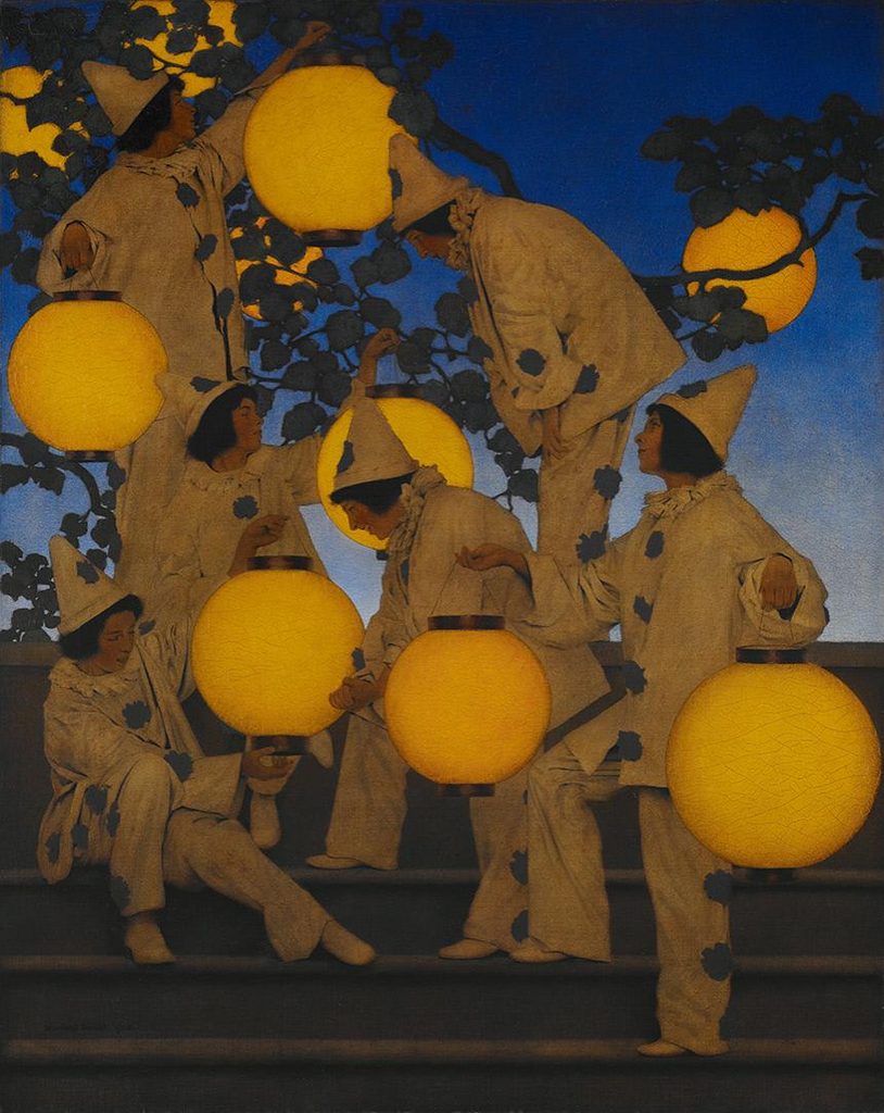 Group of women dressed as clowns hang gold-hued lanterns, which glow against the blue night sky
