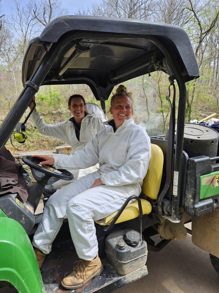 Trails and Grounds Beekeepers Joanna Mentzer, Manager of Horticultural Operations, and Libby Storie, Horticulturist, prepare to split a hive.