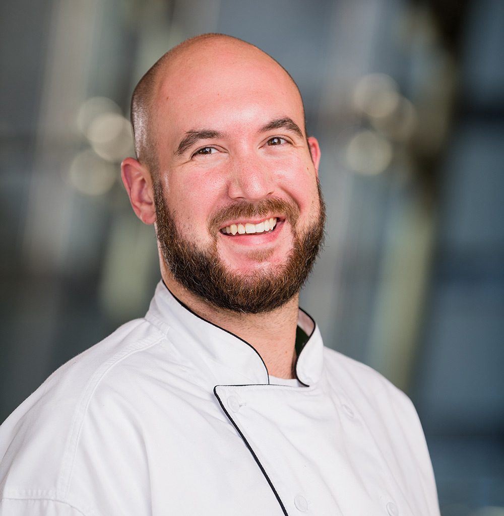 Man in white chef’s coat
