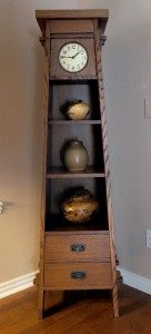 This bookcase and clock combination is a variation Myron Williams created on a classic Stickley design.