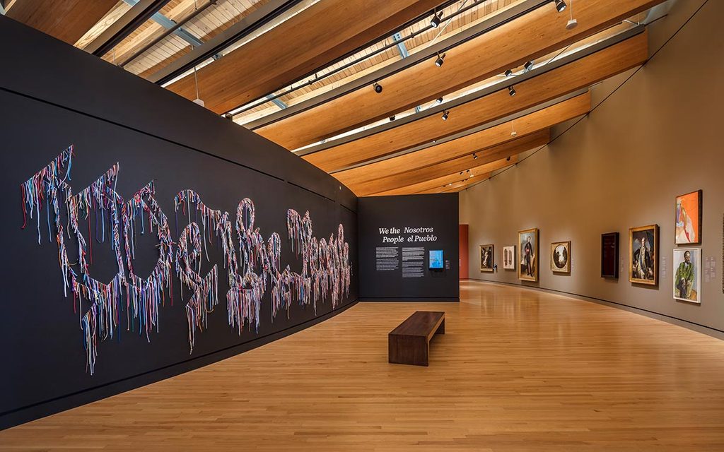 Modern gallery with colorful mural, 