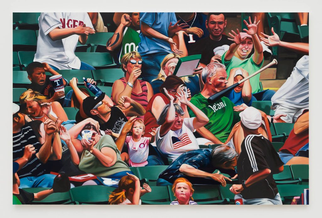 Crowd in stadium reacts with surprise to object flying towards them, showing various expressions.