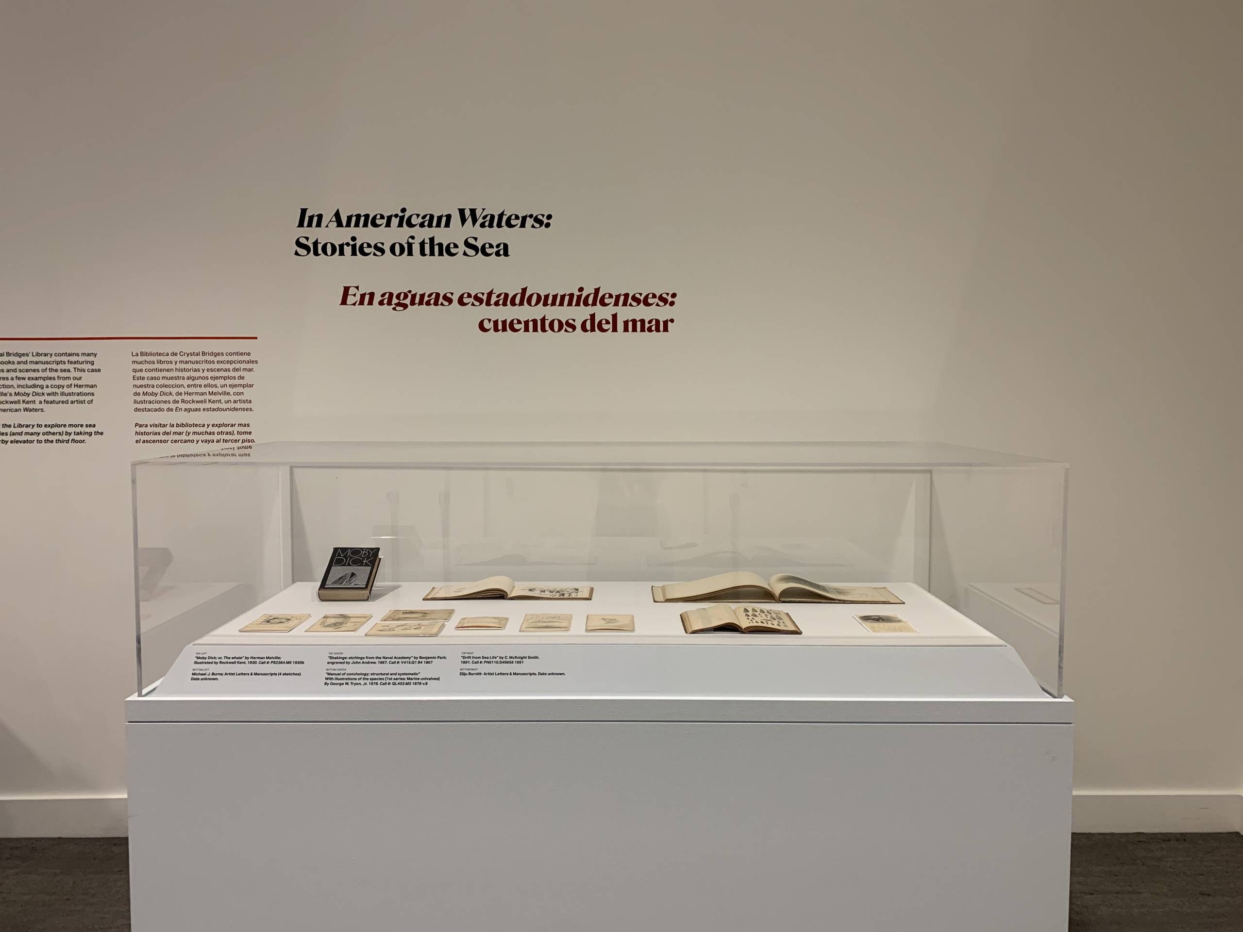 image of a kiosk of rare books inspired by In American Waters; image of a kiosk of rare books inspired by In American Waters; found in the Crystal Bridges Library collection