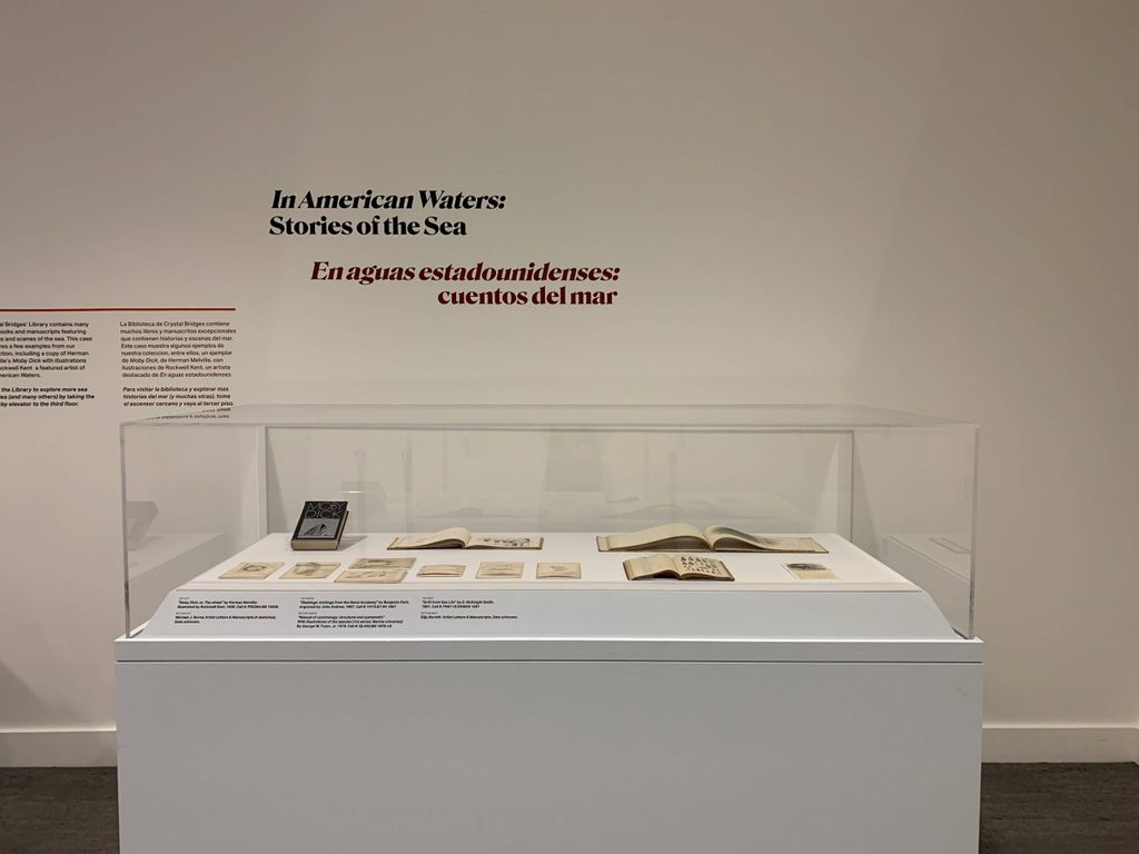 image of a kiosk of rare books inspired by In American Waters; image of a kiosk of rare books inspired by In American Waters; found in the Crystal Bridges Library collection