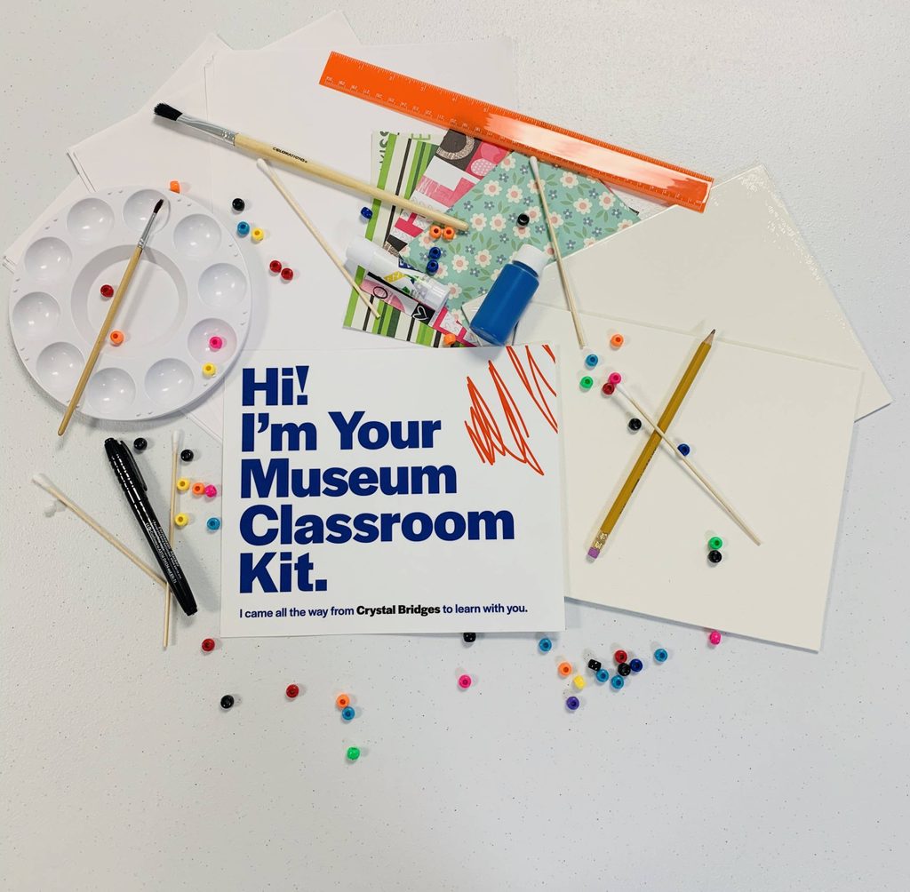 Art supplies with paintbrushes, beads, a ruler, pencils, palette, and 