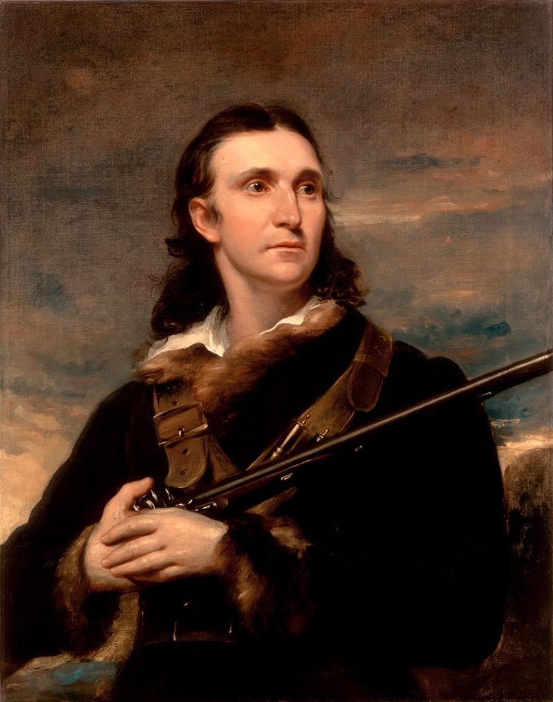 Portrait of person with long hair in fur-trimmed coat holding rifle, muted sky background.