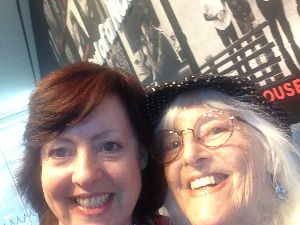 a mom and daughter visitors pose in the soul of a nation exhibition
