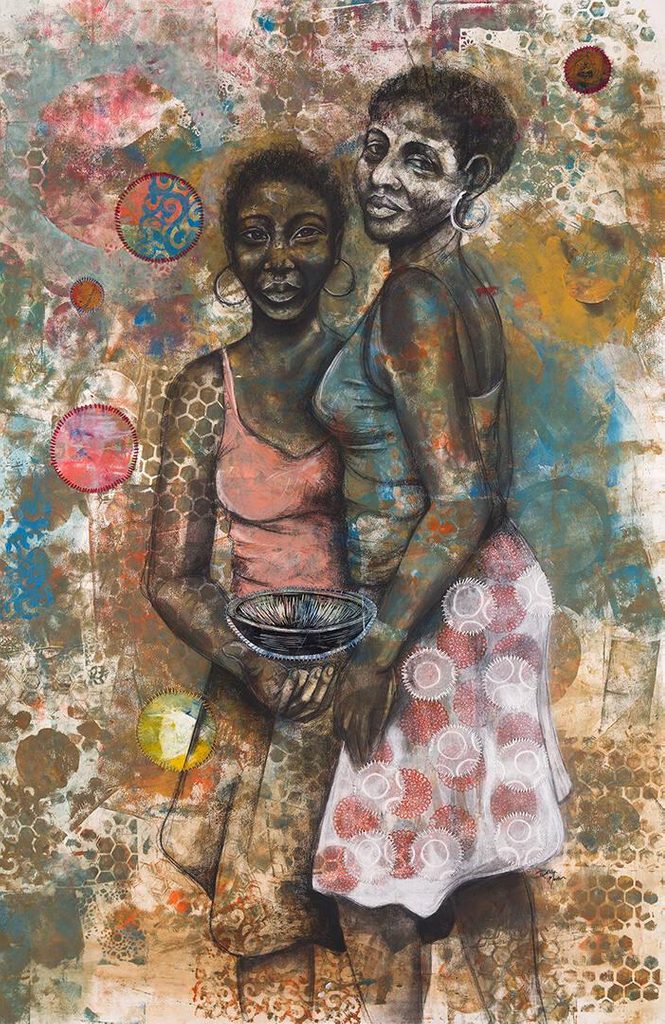 Two African American Women, stnading against a multi-colored background.