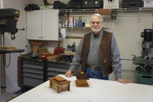 Crystal Bridges volunteer and woodcrafter Myron Williams in his workshop. 