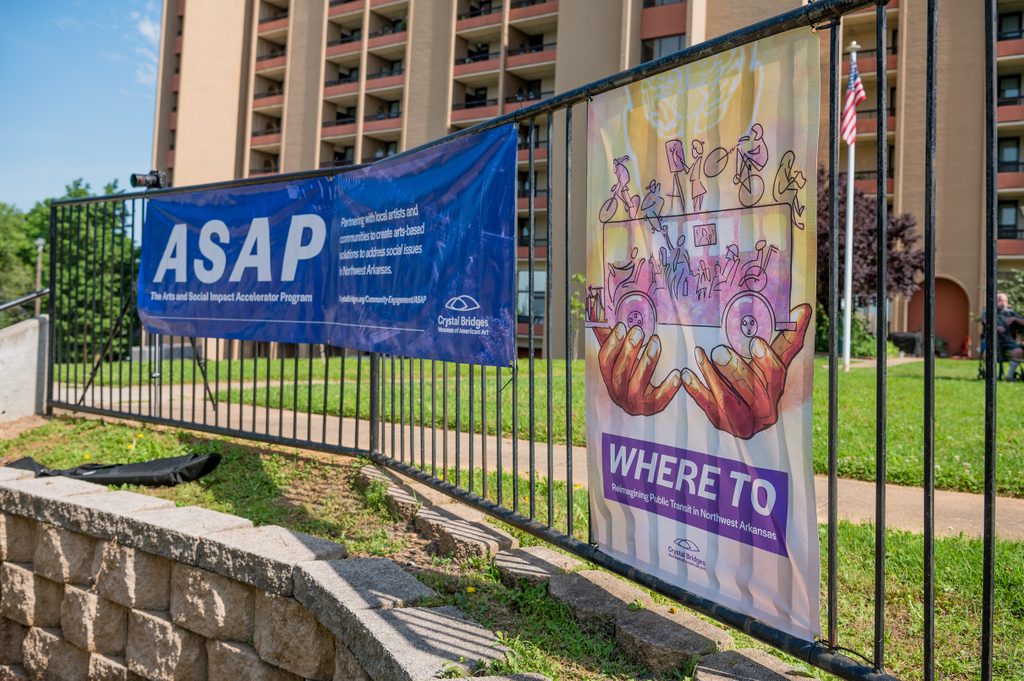 Community event in fayetteville featuring event banners