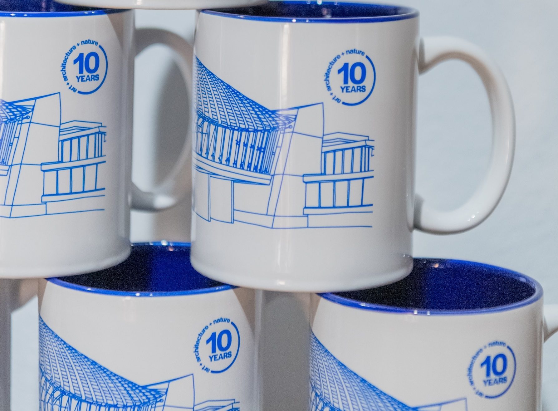 crystal bridges ten-year anniversary mugs