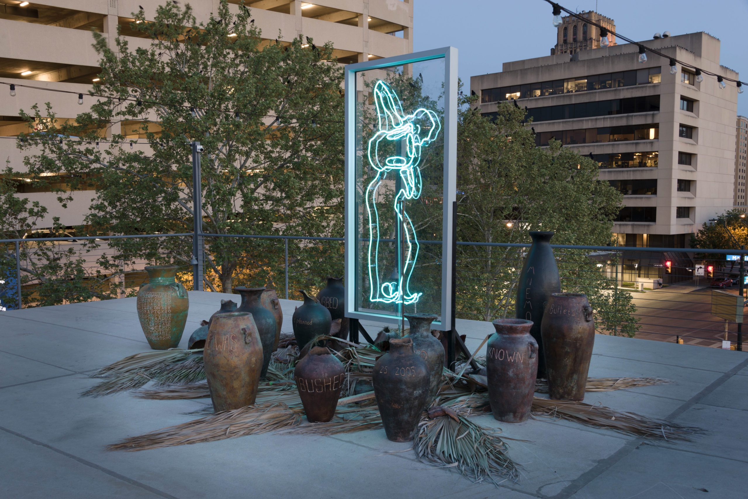 One of the works that will be featured in State of the Art 2020. Sama Alshaibi, The Cessation, 2019, Neon, aluminum, acrylic, copper, palm fronds, terracotta and sound, Dimensions variable, Courtesy of Sama Alshaibi; originally commissioned by Artpace San Antonio, Photo by Seale Photography Studios, &copy;Artpace San Antonio