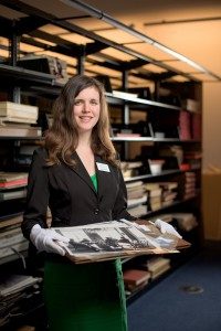 Archivist and Cataloger Valerie Sallis with items from Crystal Bridges' archive. © 2015 Stephen Ironside/Ironside Photography