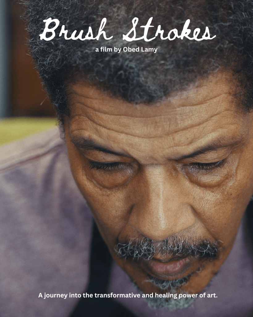 Close-up of an older man with gray hair and beard in the film Brush Strokes by Obed Lamy.