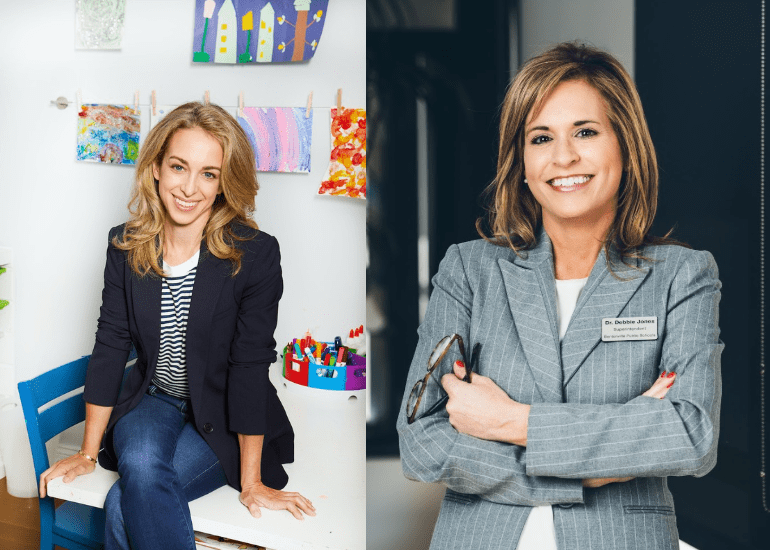 Two women, one seated with children's art, the other standing, smiling, arms crossed.